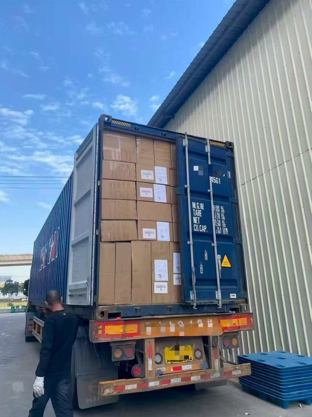 Cartons loaded inside a shipping container